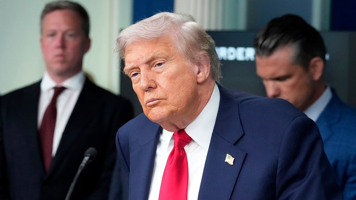 President Donald Trump listens to a question from a reporter in Washington, D.C.