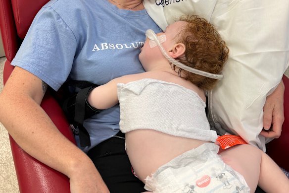 Doctors say 14-month-old Gold Coast toddler Dustin Wildman is slowly improving after accidentally ingesting metallic rose gold dust powder, but have warned he could suffer “lifelong issues”.