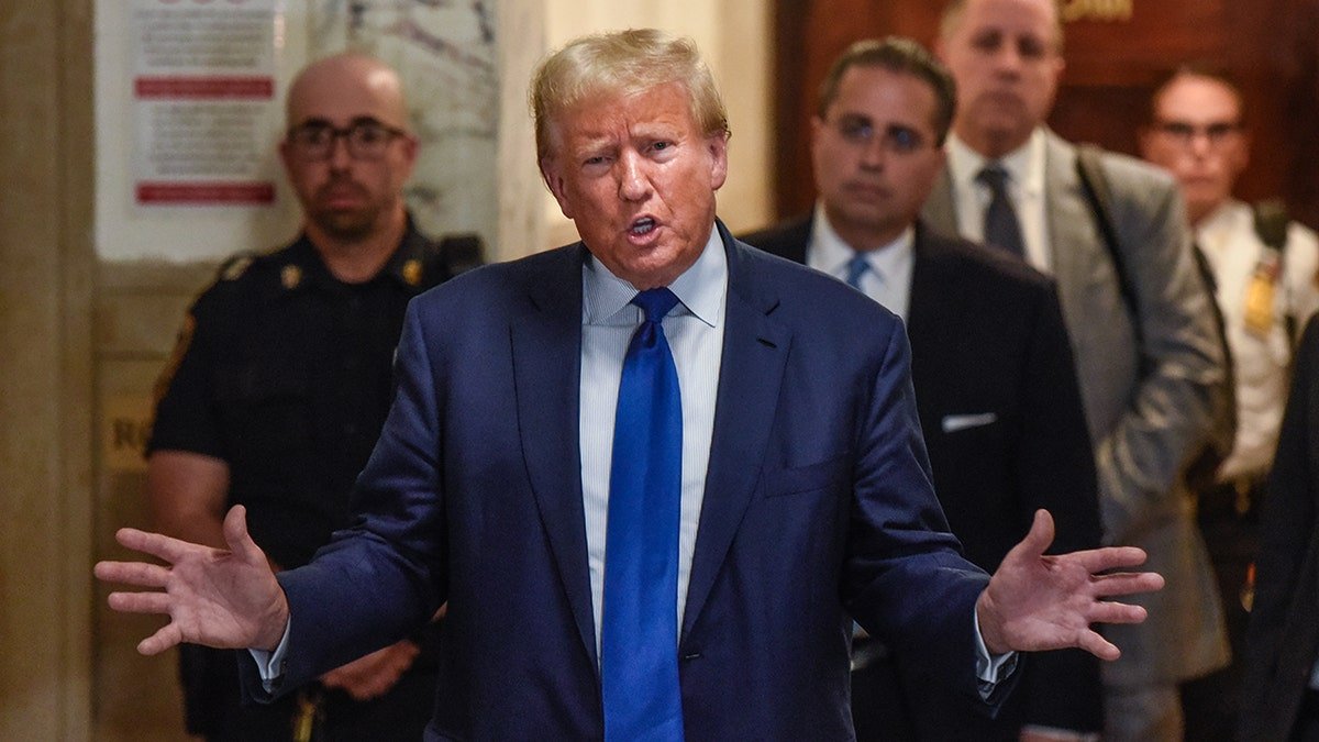 Former President Donald Trump speaking to media outside New York State Supreme Court