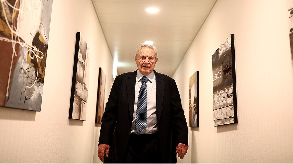 George Soros walking on the sidelines of the World Economic Forum in Davos Switzerland