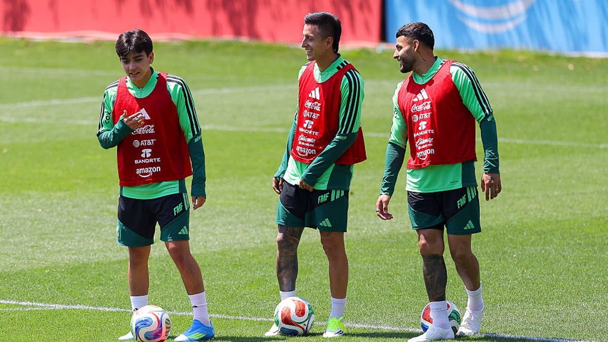 MEXICO CITY, MEXICO - MAY 20: Roberto Alvarado and Alexis Vega of Mexico laugh during a training session at CAR on May 20, 2026 in Mexico City, Mexico. (Photo by Agustin Cuevas/Getty Images)