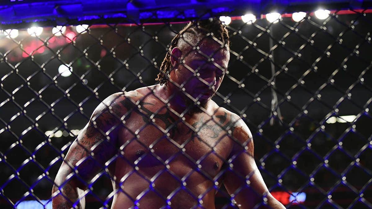 Greg Hardy walking in octagon after loss at UFC 264 in Las Vegas