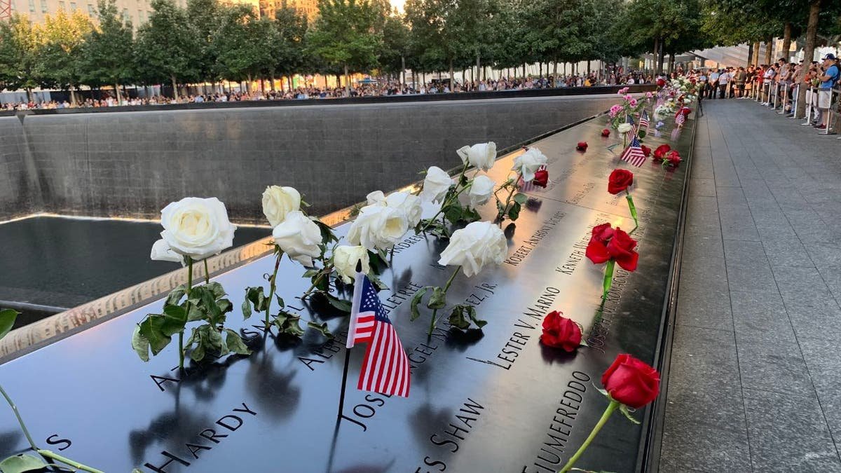 Colorful flowers left by mourners at the 9/11 Memorial in New York City