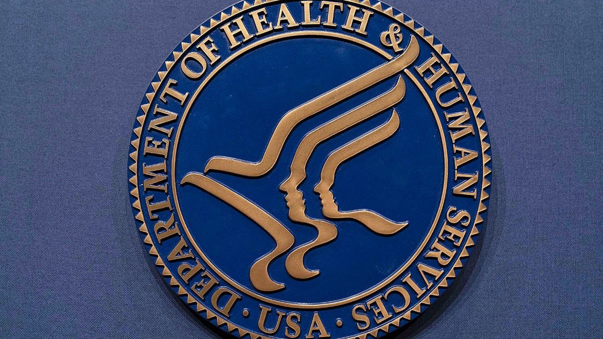 The Health and Human Services seal displayed at the Hubert Humphrey Building Auditorium