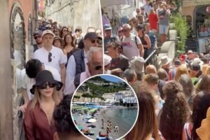 Hordes of tourists seeking cheap travel are trapping villagers inside their homes: ‘We have reached our limit’
