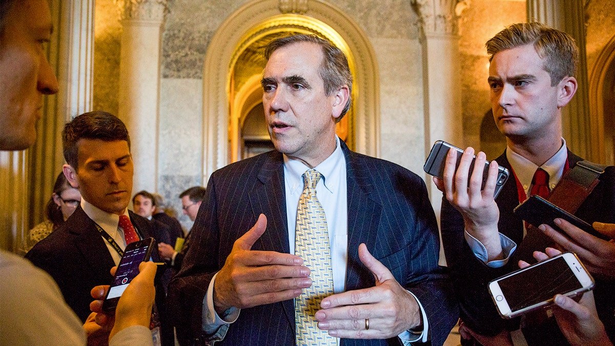 Sen. Jeff Merkley speaking to reporters after an overnight address