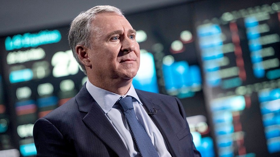 Ken Griffin speaking during a recorded interview at a corporate office.