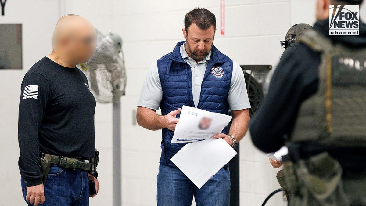 Secretary of Homeland Security Markwayne Mullin receiving briefing at ICE facility