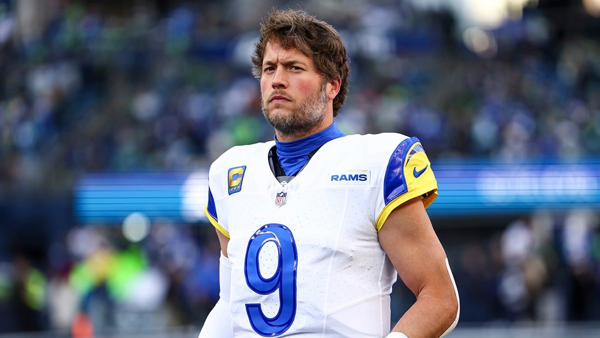 Matthew Stafford standing on the field at Lumen Field in Seattle