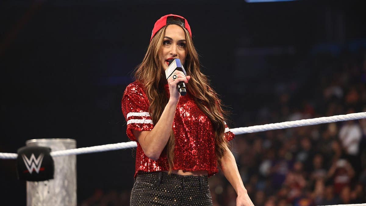 Nikki Bella speaking to crowd at Mortgage Matchup Center in Phoenix