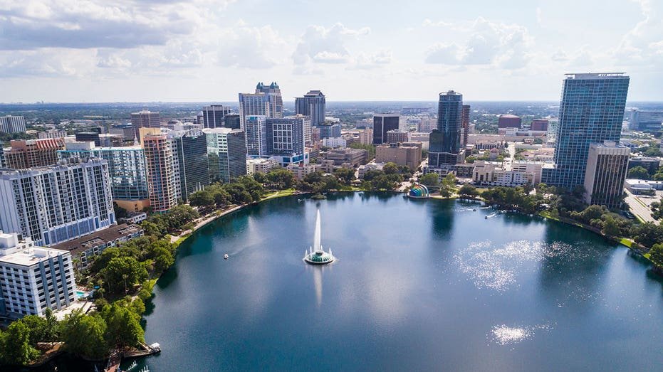 Florida, Orlando, Lake Eola Park and skyline. (Photo by: Jeffrey Greenberg/Education Images/Universal Images Group via Getty Images)