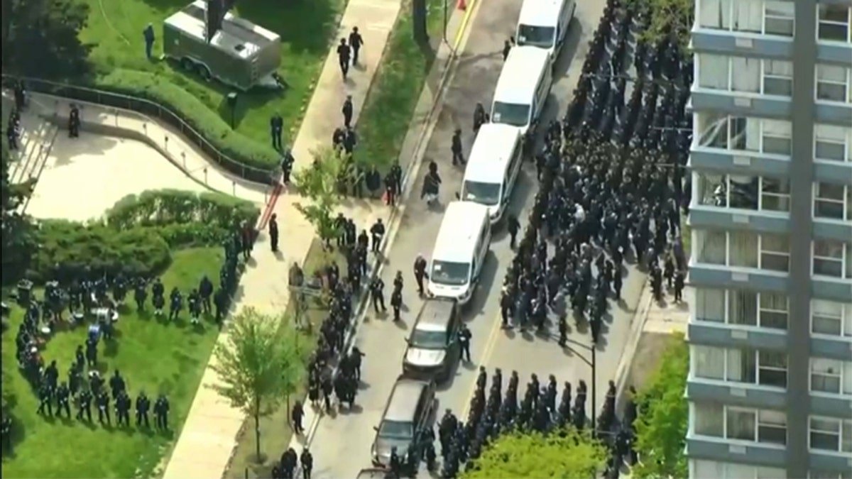 Police officers standing in formation during a funeral service