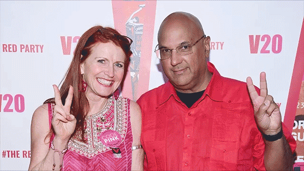 Tycoon Neville Roy Singham speaking at a forum with Jodie Evans