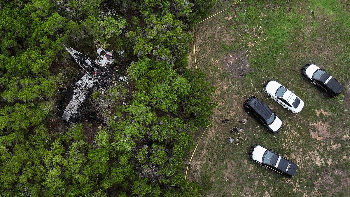 A crashed Cessna airplane in a wooded area on Round Rock Road in Wimberley, Texas