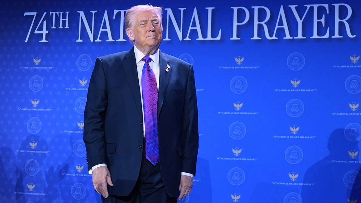 President Donald Trump arriving to speak at the National Prayer Breakfast in Washington