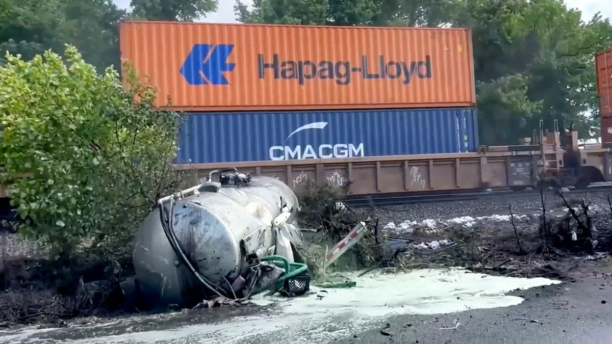 Aftermath of a train striking a septic truck.