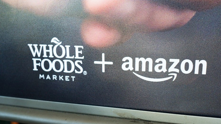 whole foods and amazon sign