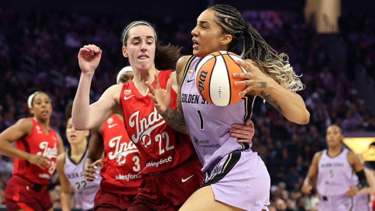 Caitlin Clark made WNBA history again, but Golden State's relentless defense and a hostile crowd powered a narrow win. (Photo by Ezra Shaw/Getty Images)