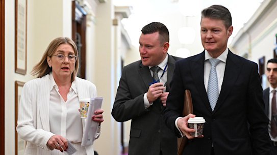 Victorian Premier Jacinta Allan and Deputy Premier Ben Carroll (right) arrive at the caucus meeting.