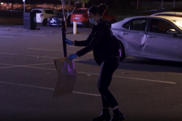 Police collecting evidence at the crime scene.