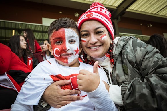 Colour my world: Berna Erkan was happy to bring her son, Aren, 6, to watch Turkey play Australia on the big screen in Broadmeadows.
