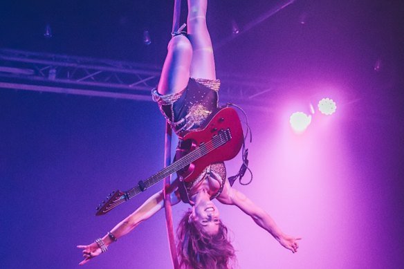 Pseudo Echo guitarist Andrea Krakovska is also an aerialist.