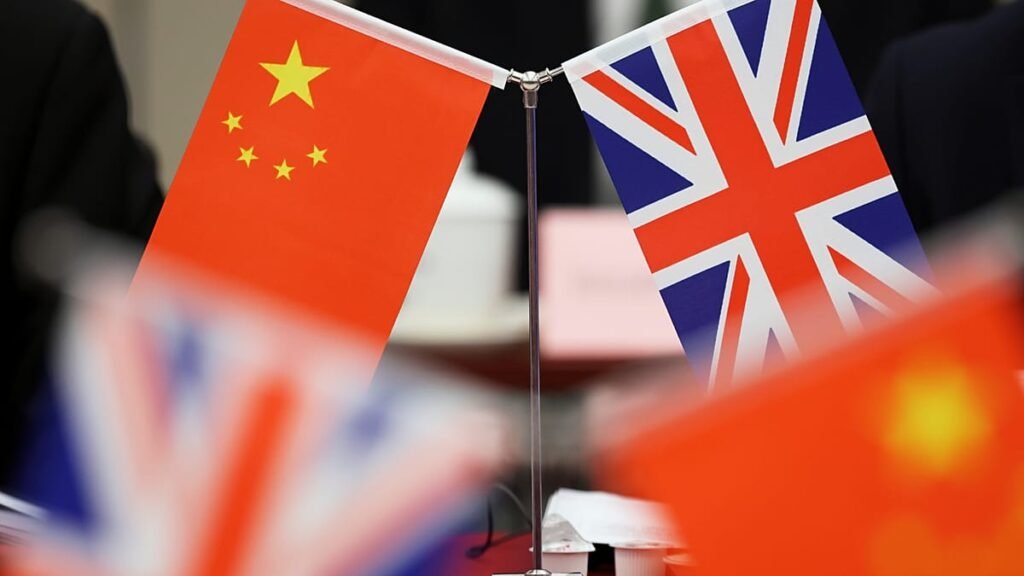 Two Chinese-British dual nationals jailed in dissident spying case Two Chinese-British dual nationals jailed in dissident spying case