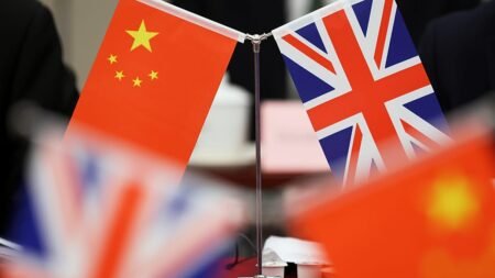 Two Chinese-British dual nationals jailed in dissident spying case Two Chinese-British dual nationals jailed in dissident spying case