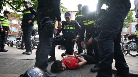 Morocco’s World Cup win sparks celebrations and clashes in the Hague