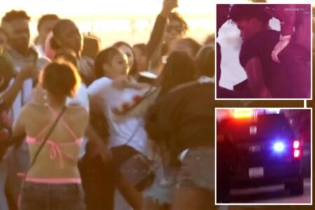 Wild brawl breaks out as hundreds of teens descend on SoCal beach