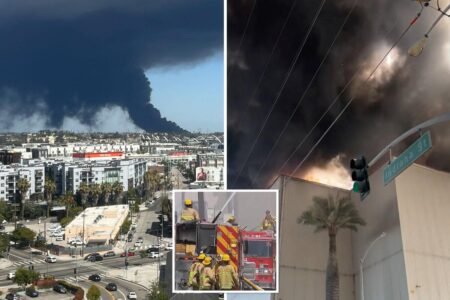 Fire department issues urgent warning as choking smoke from massive LA warehouse blaze blankets city Fire department issues urgent warning as choking smoke from massive LA warehouse blaze blankets city