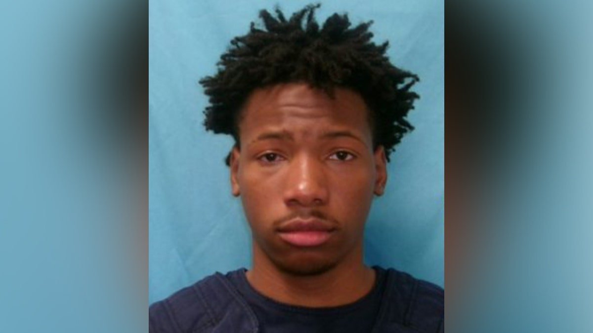 Karmelo Anthony facing forward in a mugshot photo