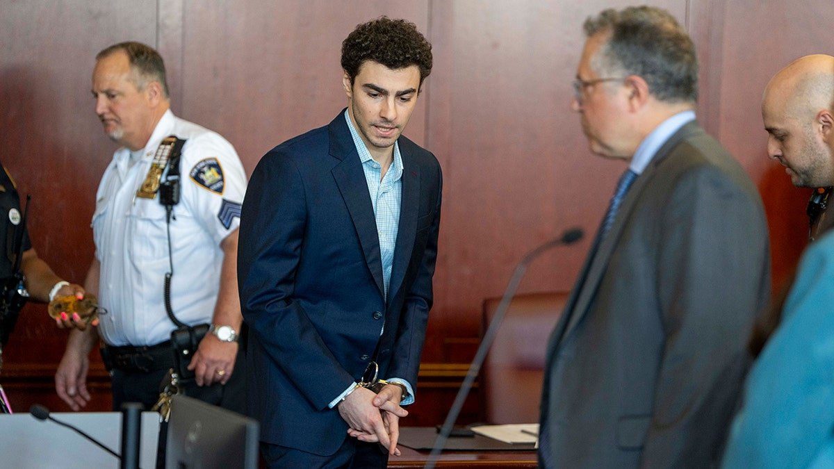 Luigi Mangione seated in courtroom during evidence suppression hearing