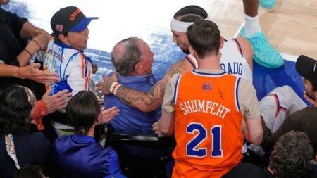 Knicks guard nearly wipes out Michael Bloomberg diving for loose ball during NBA Finals Game 3 Knicks guard nearly wipes out Michael Bloomberg diving for loose ball during NBA Finals Game 3