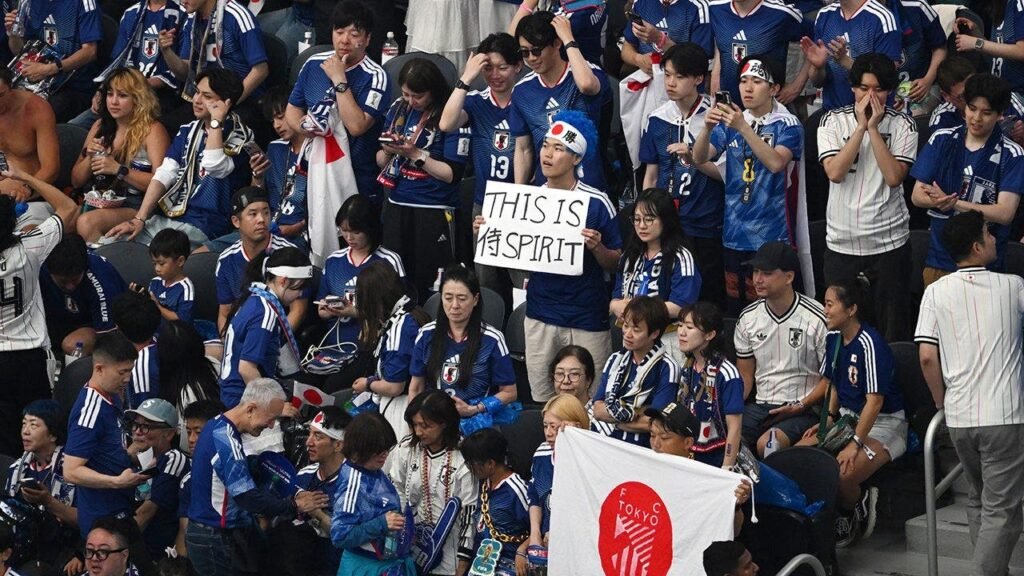 Japanese World Cup fans clean up stadium with NFL quarterback after team draws with the Netherlands Japanese World Cup fans clean up stadium with NFL quarterback after team draws with the Netherlands