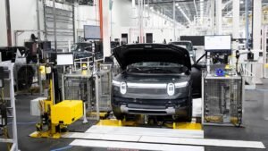 Rivian lays off hundreds in service division as it restructures teams Rivian lays off hundreds in service division as it restructures teams
