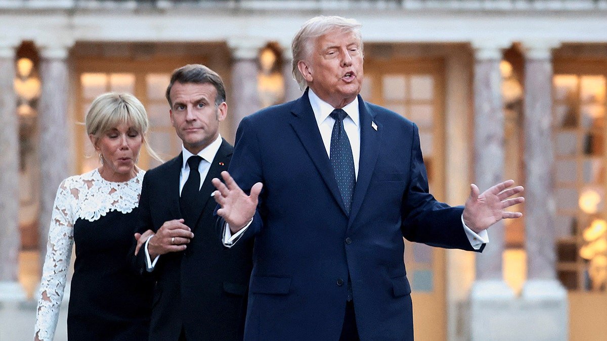 French President Emmanuel Macron and wife Brigitte Macron welcoming U.S. President Donald Trump at the Palace of Versailles