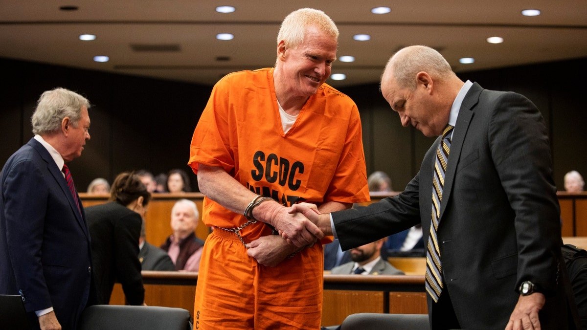 Alex Murdaugh greeting defense attorney Jim Griffin at Richland County Judicial Center in Columbia, South Carolina