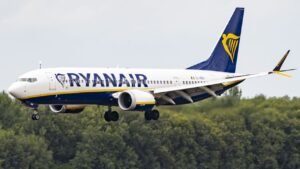 Ryanair ‘reluctantly’ ends mandatory fees for parents to sit with children amid investigation