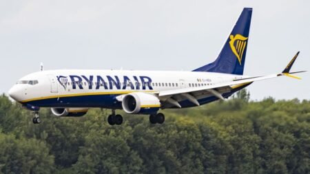 Ryanair ‘reluctantly’ ends mandatory fees for parents to sit with children amid investigation