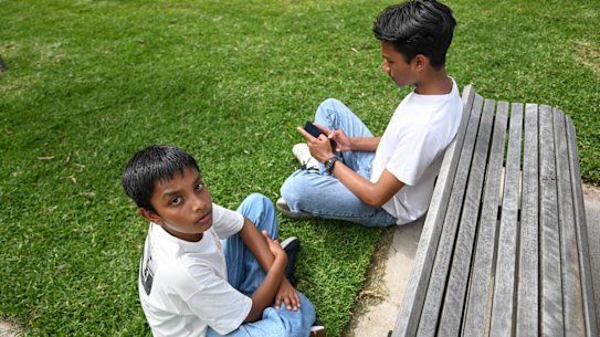 Rehan Rahman (left), 13, and his older brother Taihan.