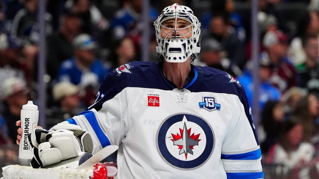 Winnipeg Jets general manager says team is ‘listening’ to trade offers for Olympic hero Connor Hellebuyck
