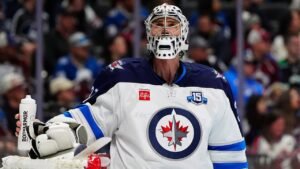 Winnipeg Jets general manager says team is ‘listening’ to trade offers for Olympic hero Connor Hellebuyck