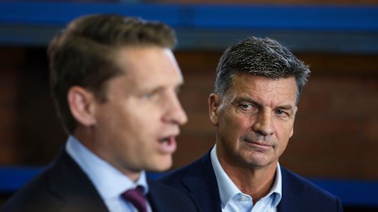 Andrew Hastie (left) says the Coalition are “overwhelmingly on the same page” about the migration policies slated by Angus Taylor (right).