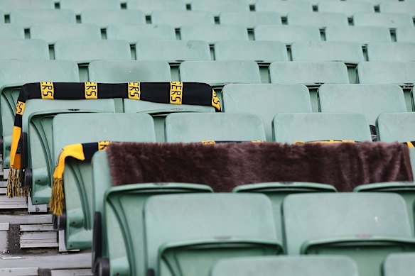 Scarves draped across seats at the Melbourne Cricket Ground.
