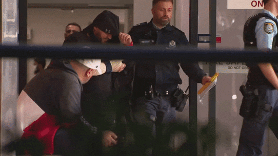 Moahmmed Skaf escorted from Bankstown Hospital by police. The notorious gang rapist has been accused of directing a group engaged in alleged drug supply.