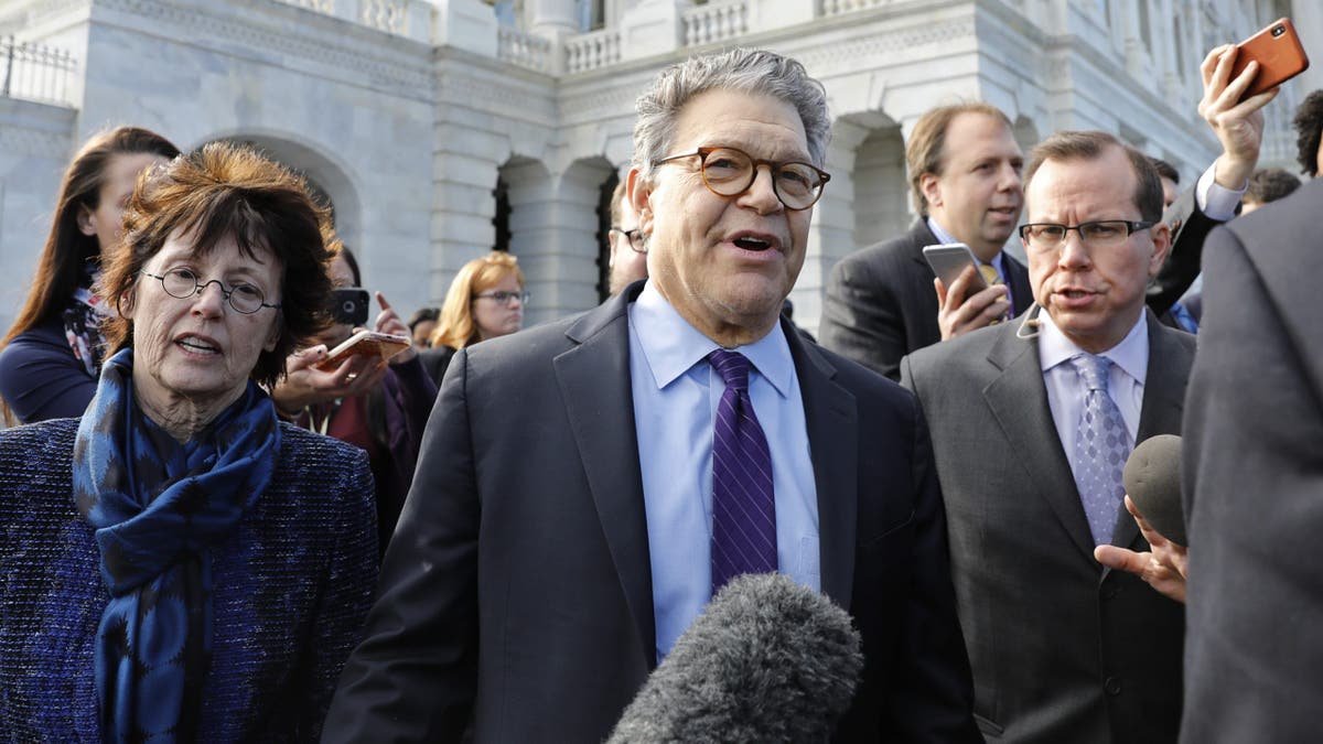 U.S. Sen. Al Franken walking with his wife Franni outside the U.S. Capitol