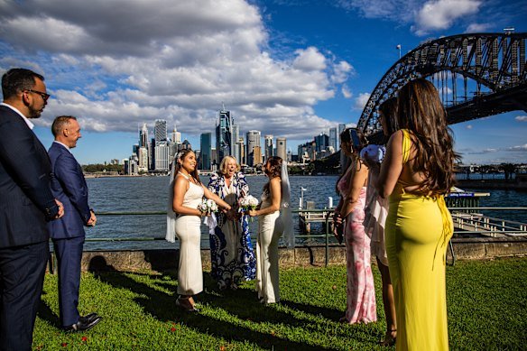 Carolina and Isneida tie the knot at Copes Point in Kirribilli – one of more than 20 locations covered by the council policy.