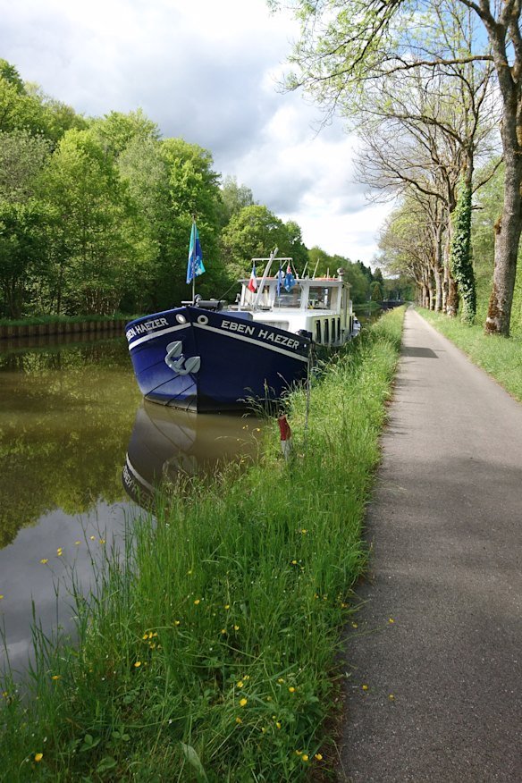 A towpath by a river. 