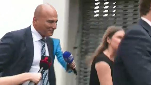 Surgeon Vahid Reza Adib arriving at Southport Police Station in May, when charges were laid.